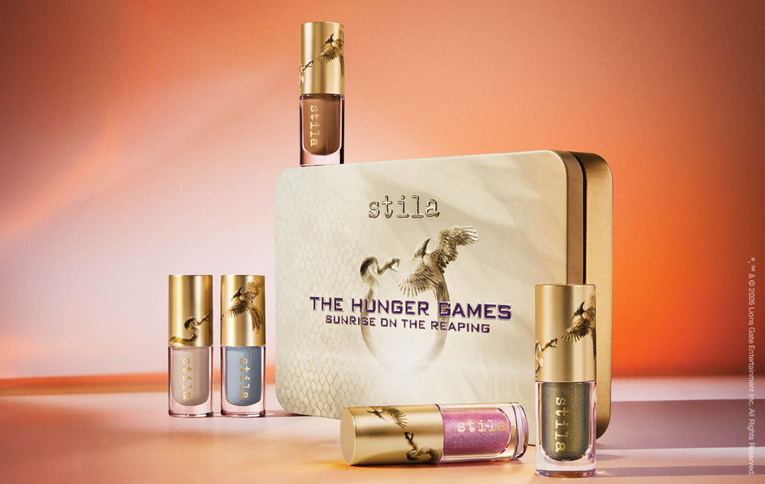 Sunrise Eyes™ Liqua-Play™ Eye Shadow Collection. This exclusive collection includes 5 travel-sized liquid eye shadows with each one inspired by a character in The Hunger Games: Sunrise on the Reaping. Stunning shades in matte to shimmer to high-sparkle finishes. All in a won’t budge, smudge or crease formula. 